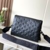 2 Louis Vuitton M11370 Black embossed leather bag with black chain.