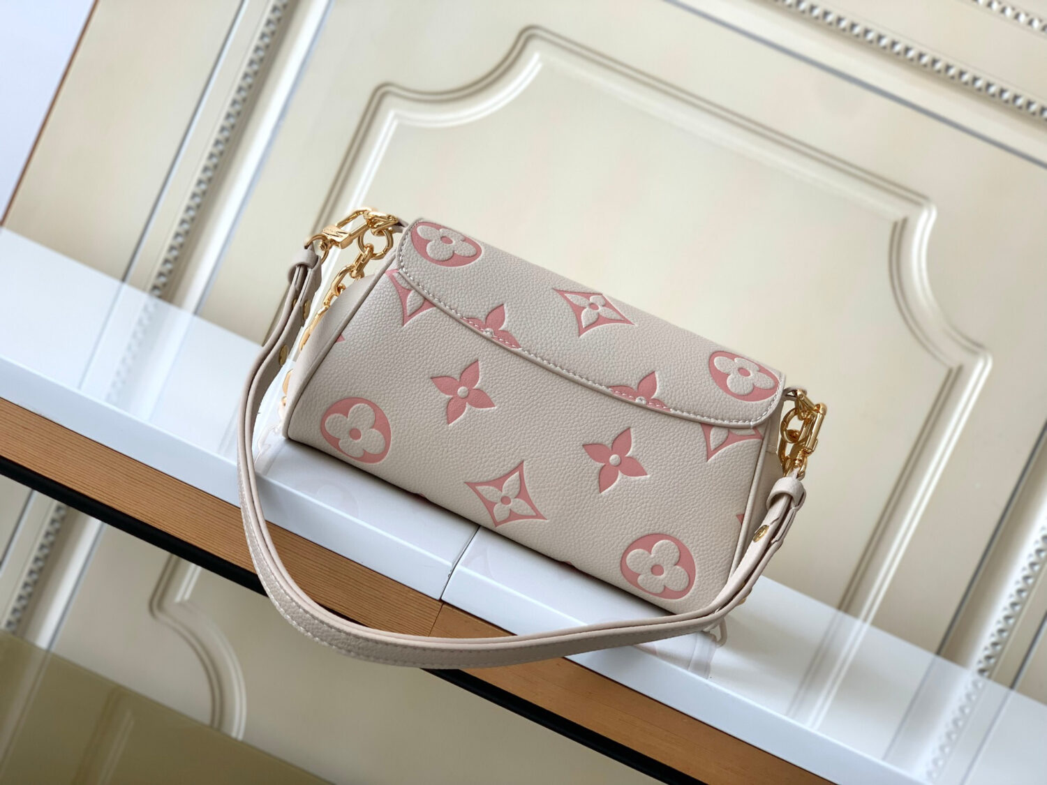 Louis Vuitton The M46393 Favorite handbag is crafted from Monogram Empreinte embossed leather.