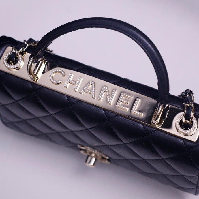 3 Chanel 25s handle with diamond embellishment