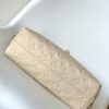 3 Louis Vuitton The Sac Sport handbag features a curved silhouette crafted from supple Monogram Empreinte embossed leather.