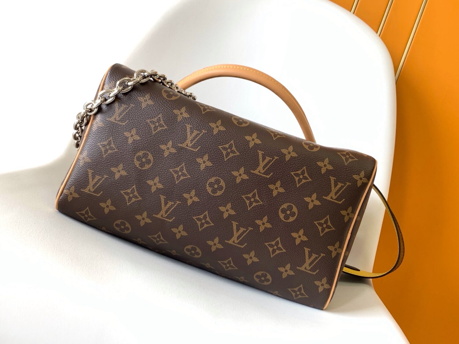 3 Louis Vuitton The Speedy Soft 30 Boho handbag is made from classic Monogram coated canvas.