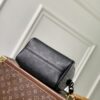 3 Louis Vuitton The M23807 black Speedy P9 Bandoulière 20 handbag is crafted from glossy calfskin leather.