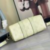3 Louis Vuitton M14078 Light Khaki Green Pillow Bag. This Keepall 25 handbag is made of Monogram Eclipse Reverse canvas.