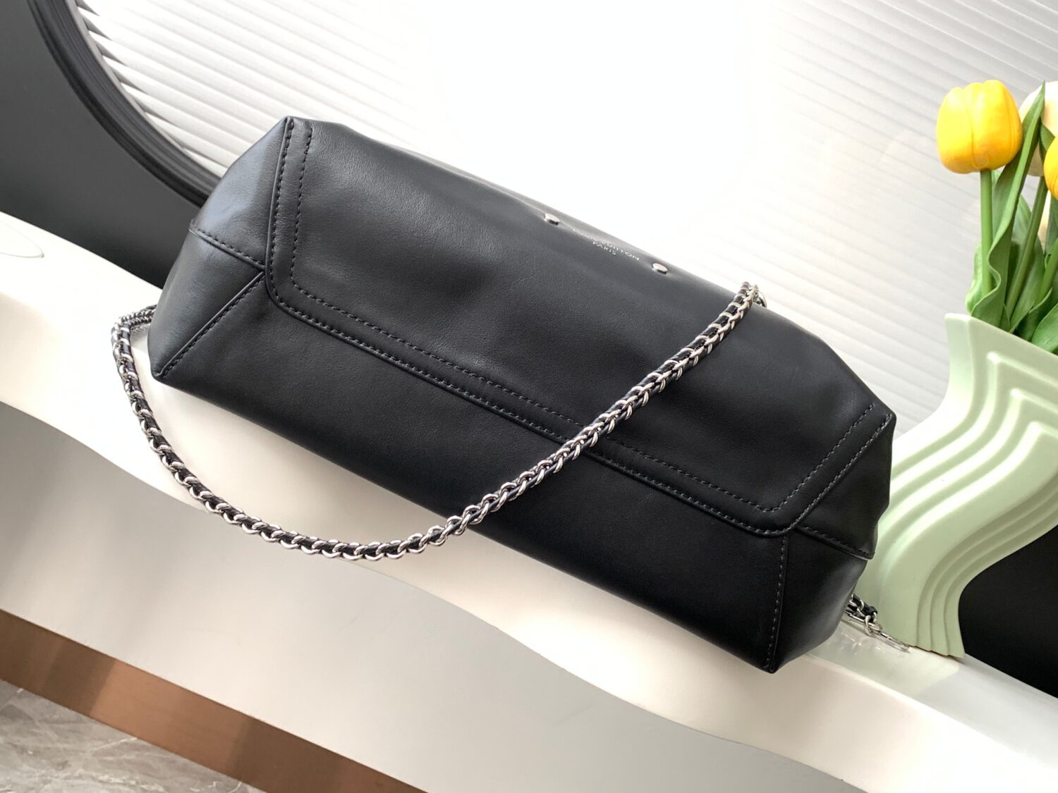 3 Louis Vuitton The M11266 Atlantis medium handbag is from the Dark Side collection.