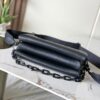 3 Louis Vuitton M11370 Black embossed leather bag with black chain.