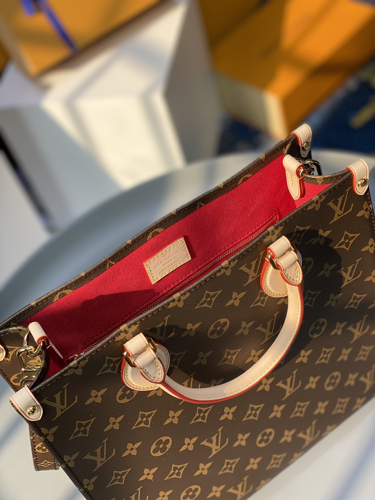 3 Louis Vuitton The M45848 classic Sac Plat medium handbag incorporates contemporary trends with its Monogram canvas and leather trim.