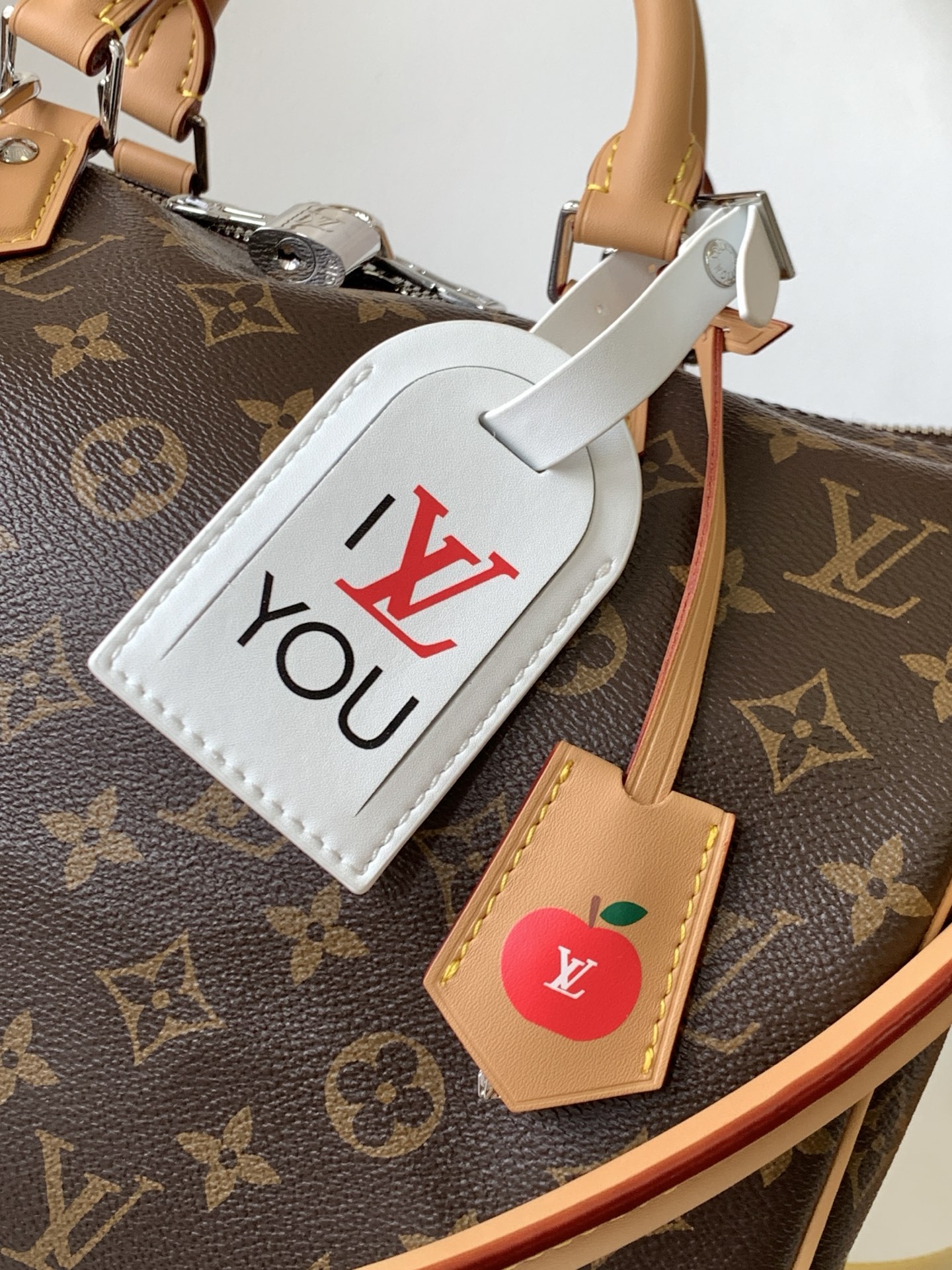 4 Louis Vuitton The Speedy Soft 30 Boho handbag is made from classic Monogram coated canvas.