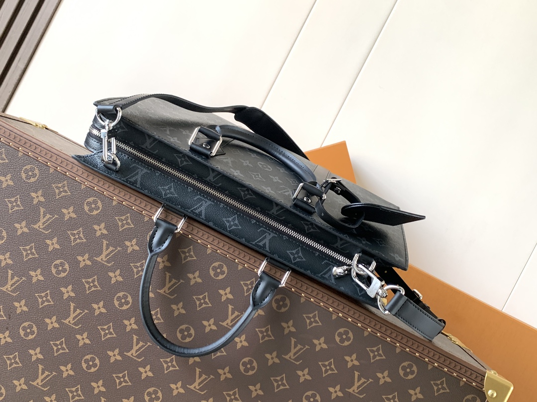 4 Louis Vuitton The M11742 black floral briefcase with zipper and 163C microcode chip is a Sac Plat 24H handbag with the elegant style of Monogram Eclipse coated canvas.
