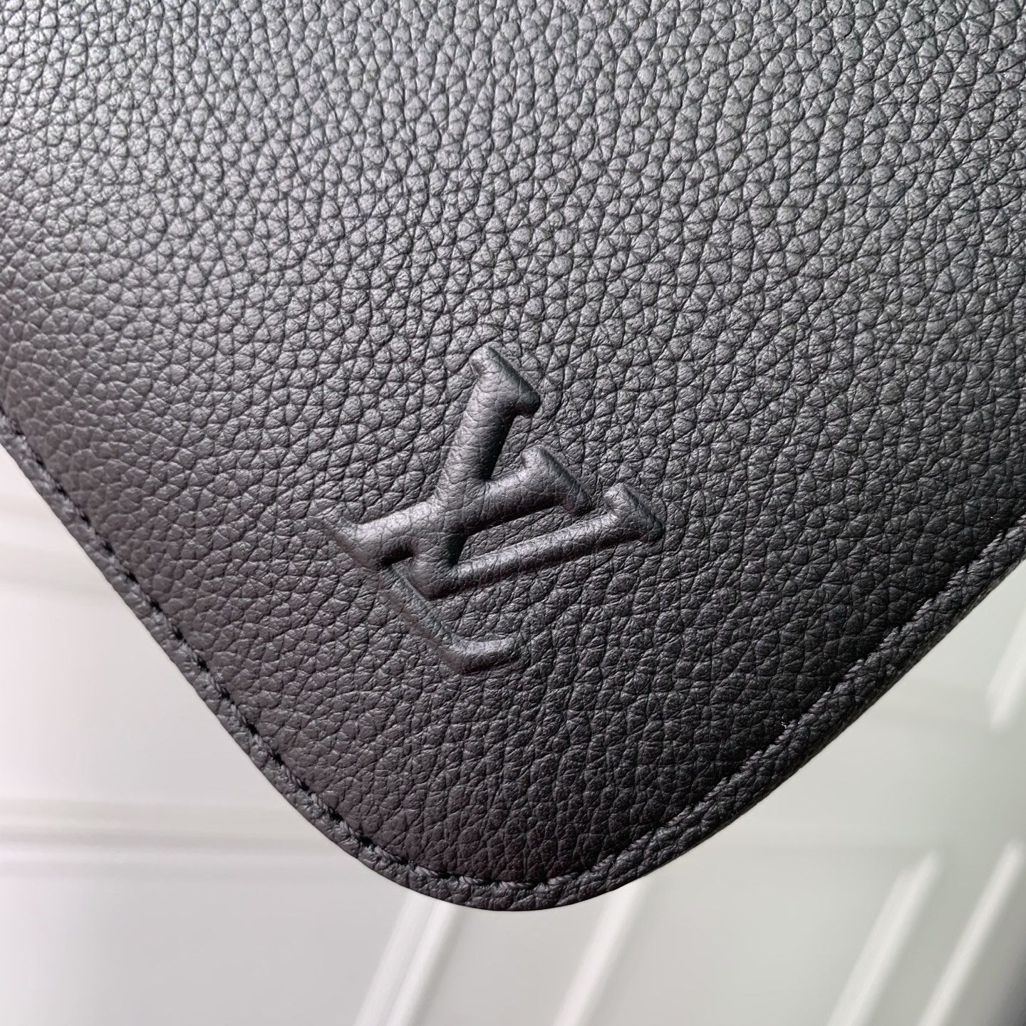 4 Louis Vuitton The M15258 Gate briefcase is crafted from waxed cowhide leather, featuring a supple design and ample space.