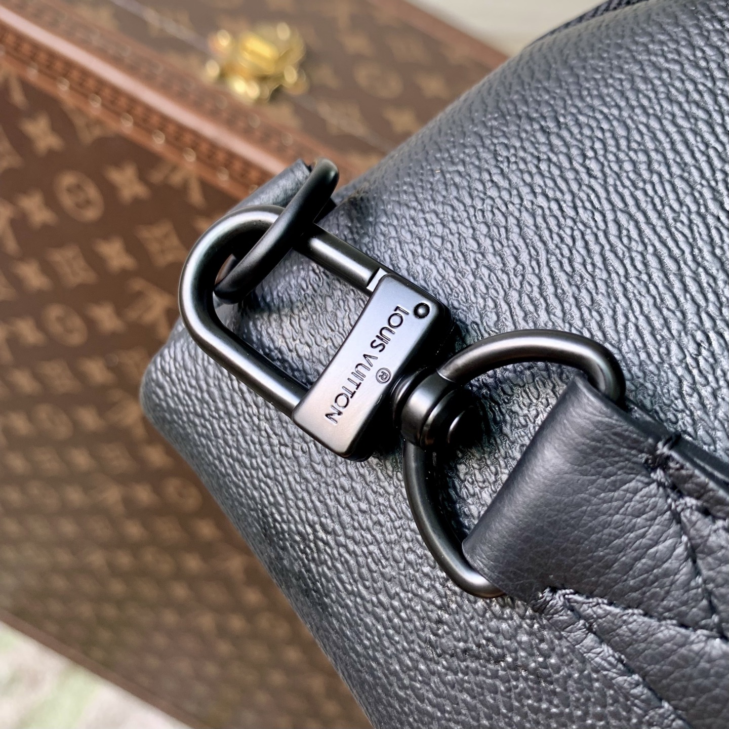 Louis Vuitton The basic silhouette of the M28399 Duo shoulder bag is crafted from the iconic monochrome Monogram Midnight canvas.