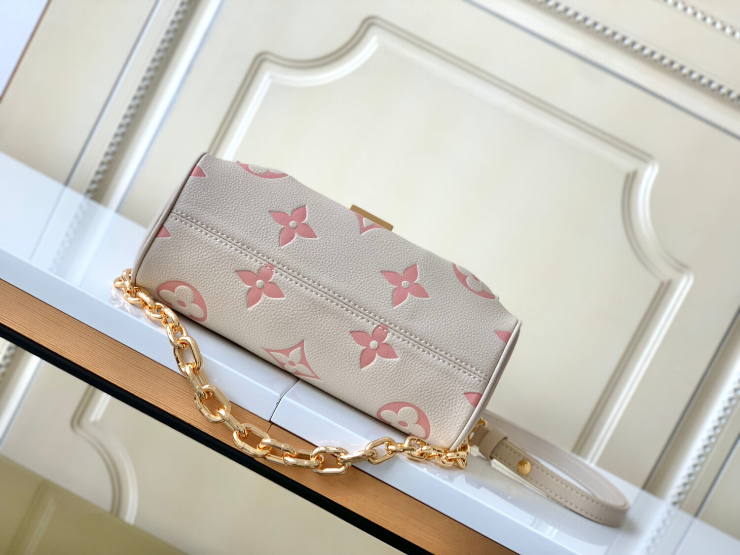 Louis Vuitton The M46393 Favorite handbag is crafted from Monogram Empreinte embossed leather.
