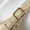 5 Louis Vuitton The Sac Sport handbag features a curved silhouette crafted from supple Monogram Empreinte embossed leather.