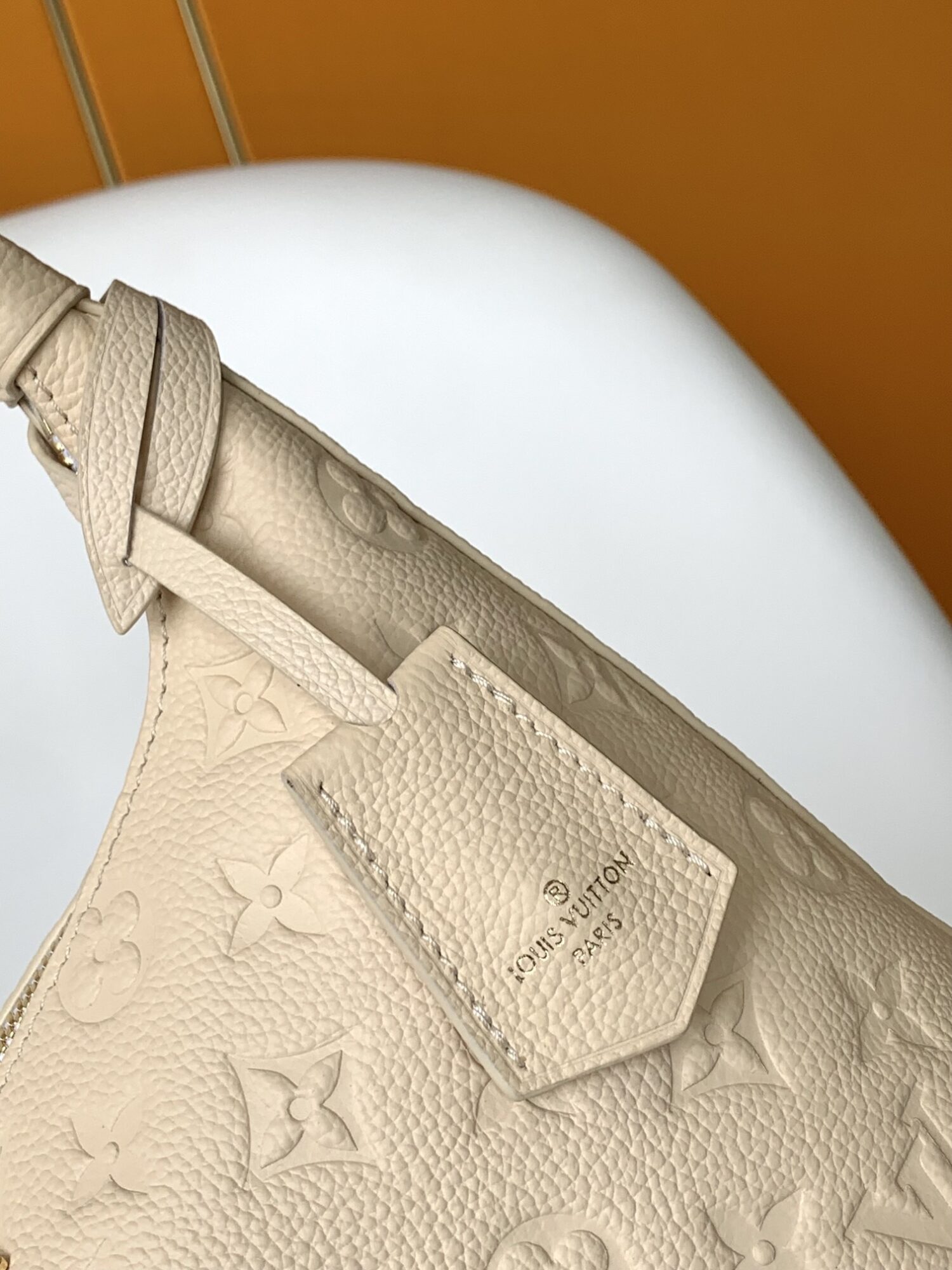 6 Louis Vuitton The Sac Sport handbag features a curved silhouette crafted from supple Monogram Empreinte embossed leather.