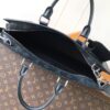 6 Louis Vuitton The M11742 black floral briefcase with zipper and 163C microcode chip is a Sac Plat 24H handbag with the elegant style of Monogram Eclipse coated canvas.