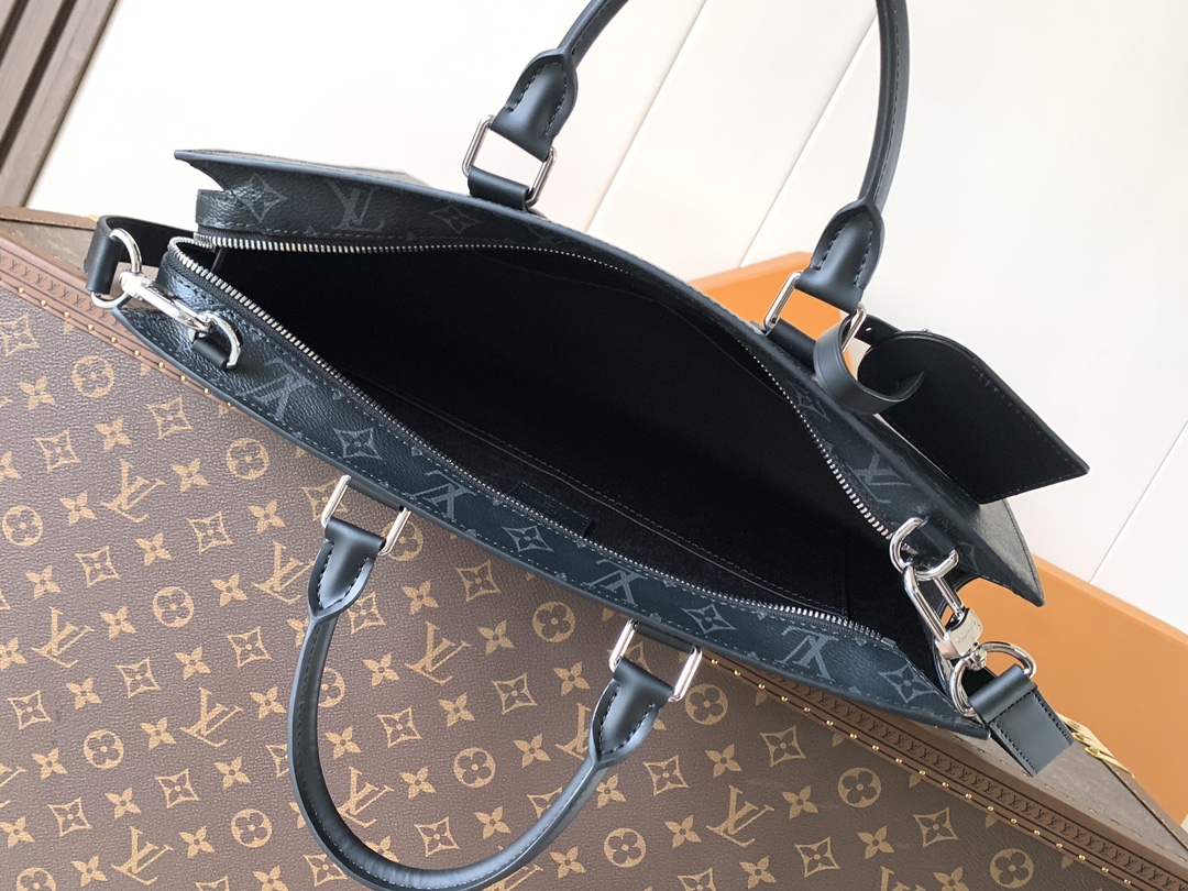 6 Louis Vuitton The M11742 black floral briefcase with zipper and 163C microcode chip is a Sac Plat 24H handbag with the elegant style of Monogram Eclipse coated canvas.
