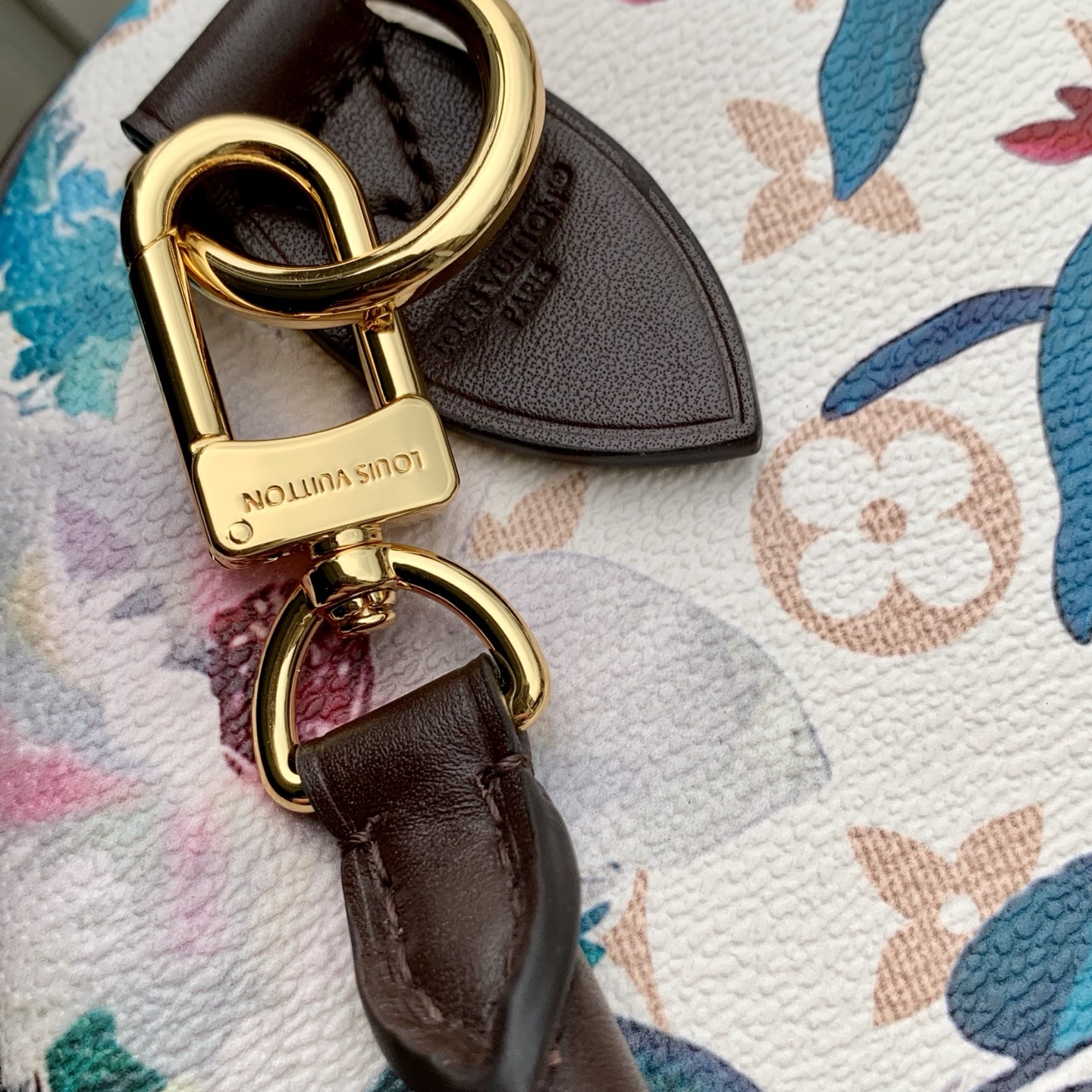 Louis Vuitton The M29066 floral Speedy 30 Soft handbag is from the Monogram Eden collection.