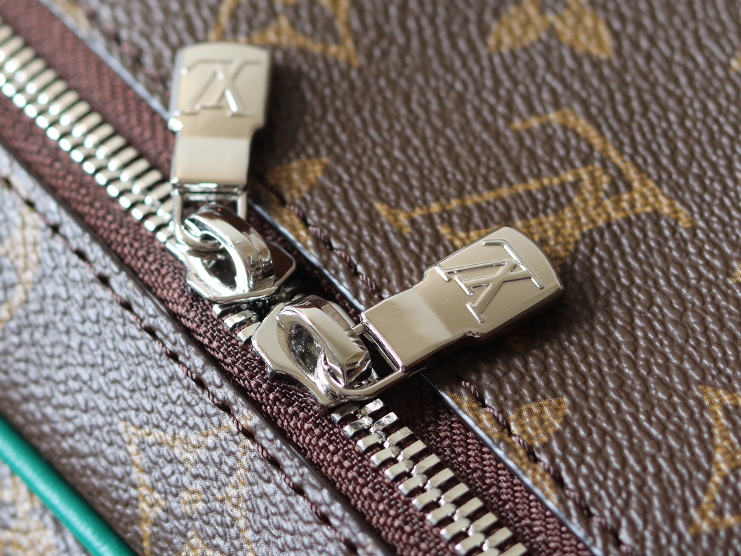 6 Louis Vuitton M12667 Green This Nice BB cosmetic bag is made from Monogram Macassar canvas.
