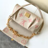 Louis Vuitton The M46393 Favorite handbag is crafted from Monogram Empreinte embossed leather.