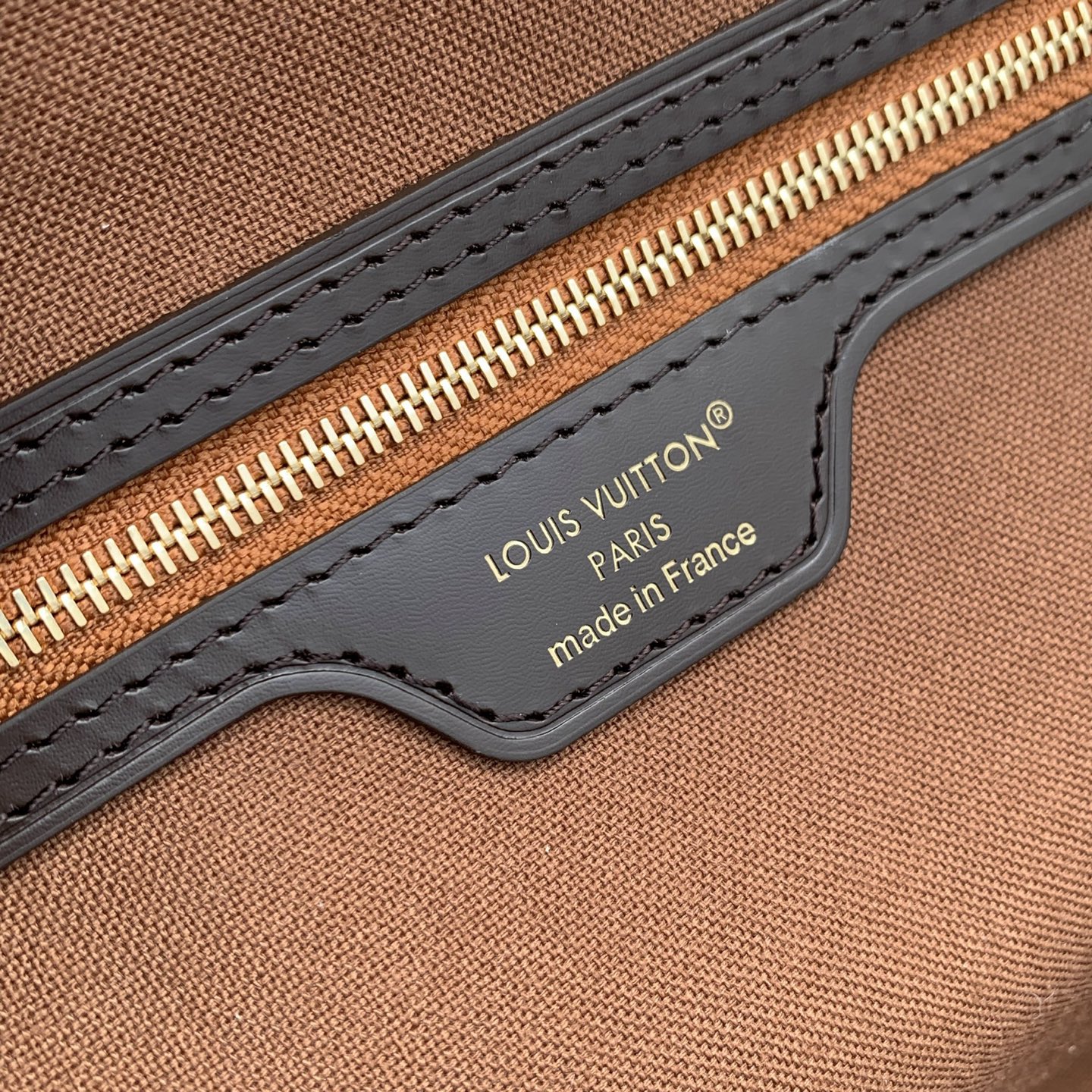 7 Louis Vuitton M28918 This Neverfull medium handbag is from the Monogram Eden collection.