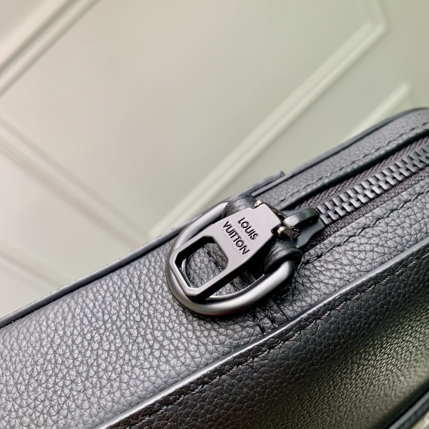 7 Louis Vuitton The M15258 Gate briefcase is crafted from waxed cowhide leather, featuring a supple design and ample space.