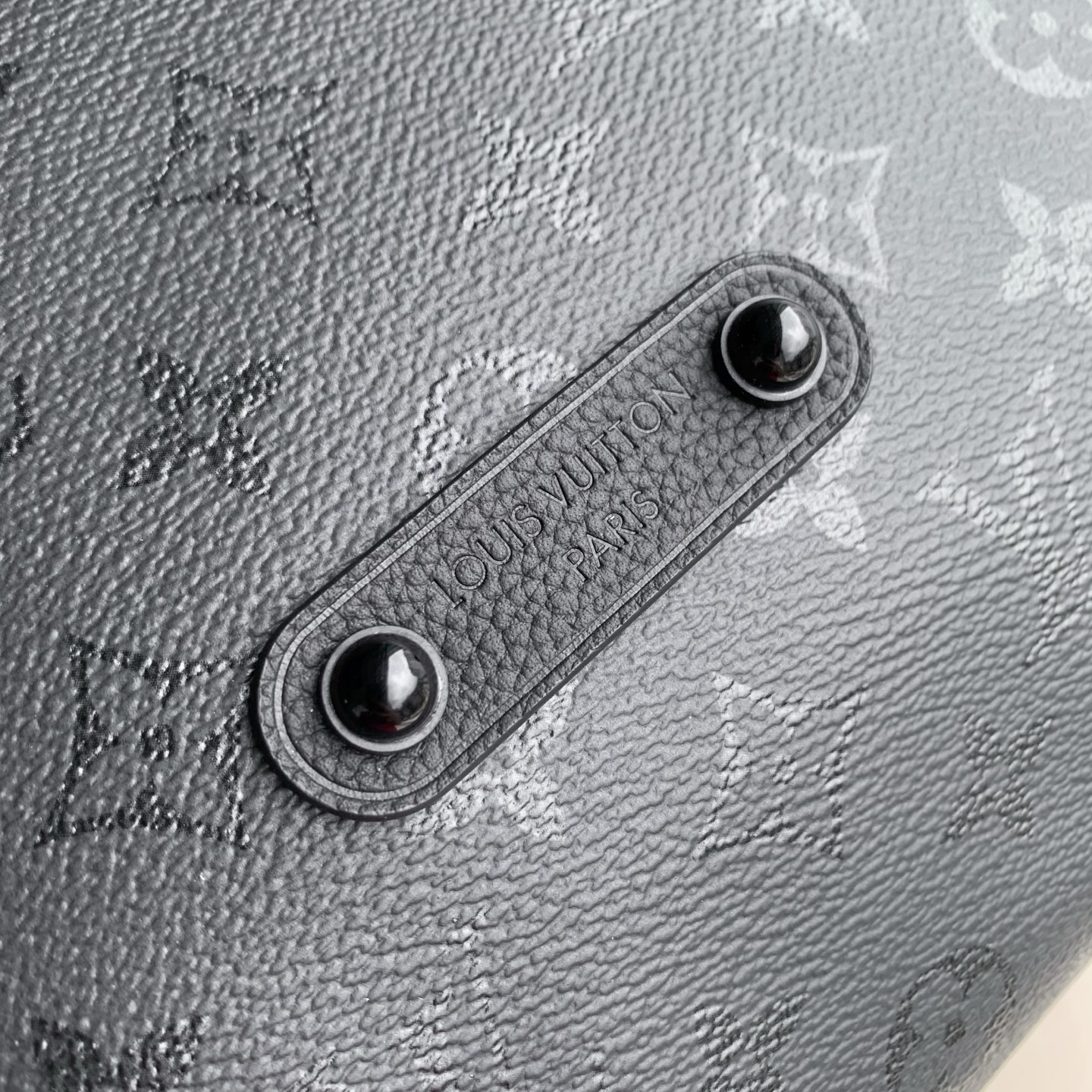 7 Louis Vuitton M27856 This Vagabond Hobo handbag is made of Monogram Midnight coated canvas with tonal calfskin leather trim.