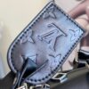 Louis Vuitton M13992 This Keepall Bandoulière 50 travel bag features a Monogram pattern on its canvas surface.