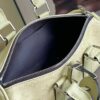 7 Louis Vuitton M14078 Light Khaki Green Pillow Bag. This Keepall 25 handbag is made of Monogram Eclipse Reverse canvas.