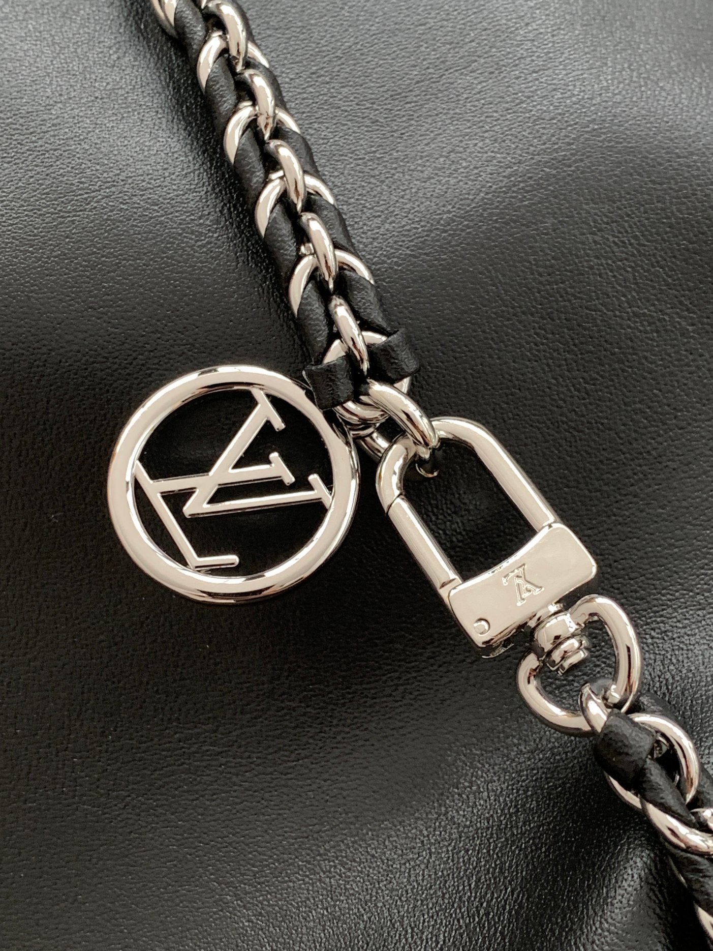 7 Louis Vuitton The M11266 Atlantis medium handbag is from the Dark Side collection.