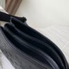 7 Louis Vuitton M11370 Black embossed leather bag with black chain.