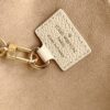 8 Louis Vuitton The Sac Sport handbag features a curved silhouette crafted from supple Monogram Empreinte embossed leather.