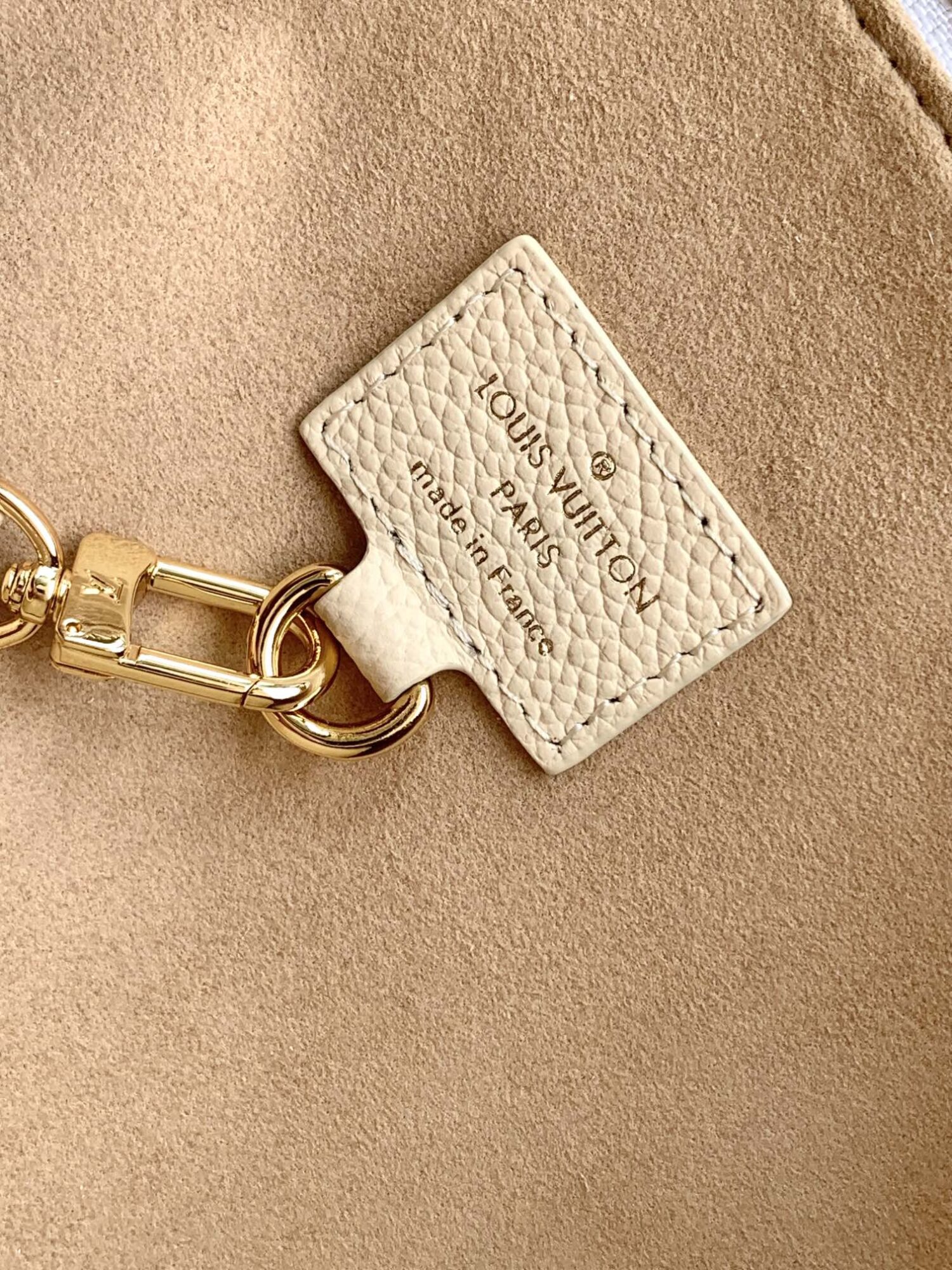 8 Louis Vuitton The Sac Sport handbag features a curved silhouette crafted from supple Monogram Empreinte embossed leather.