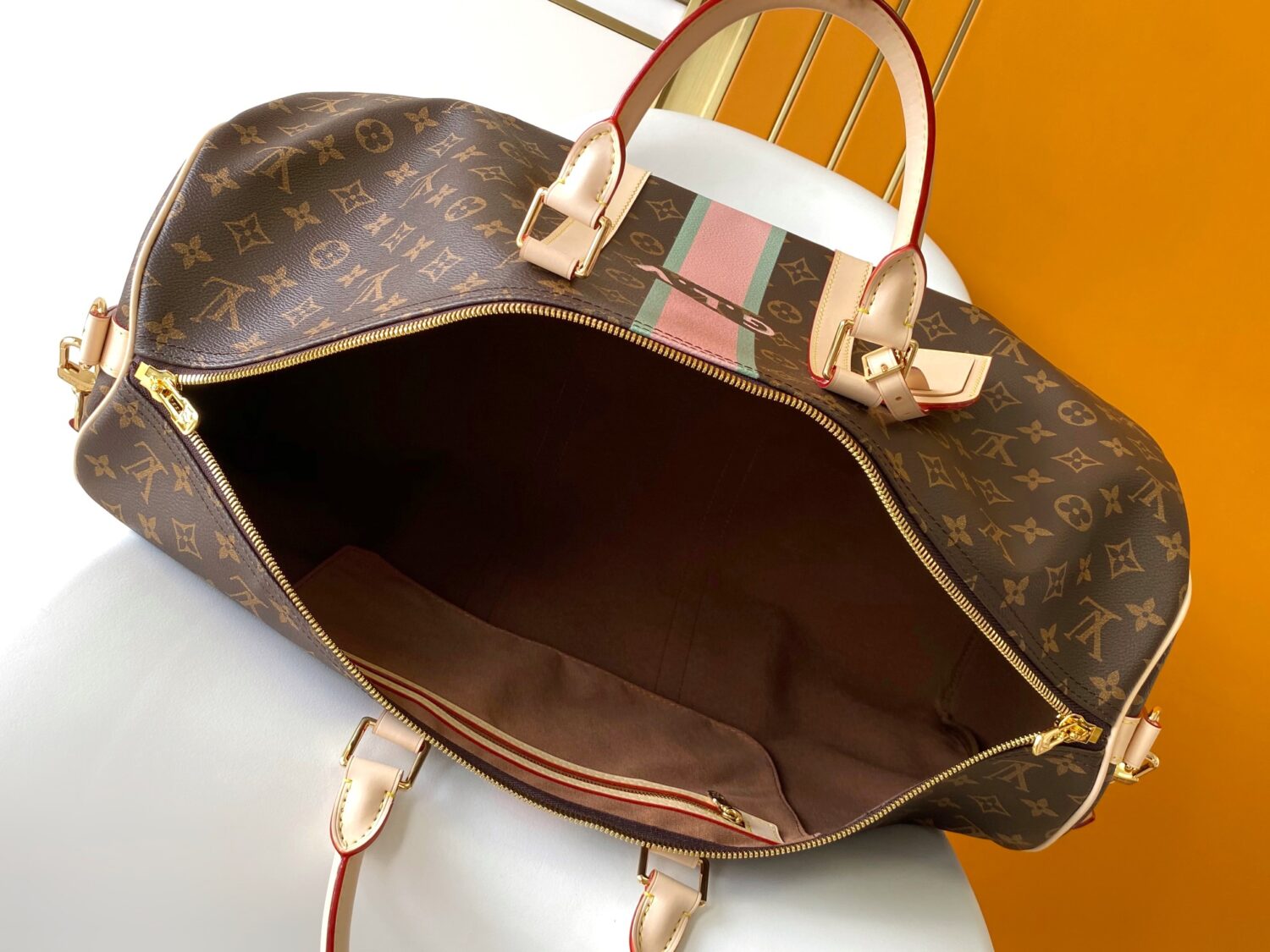 8 Louis Vuitton The Keepall Bandoulière 55 travel bag cleverly utilizes Monogram canvas to create ample space.
