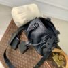8 Louis Vuitton The M23807 black Speedy P9 Bandoulière 20 handbag is crafted from glossy calfskin leather.