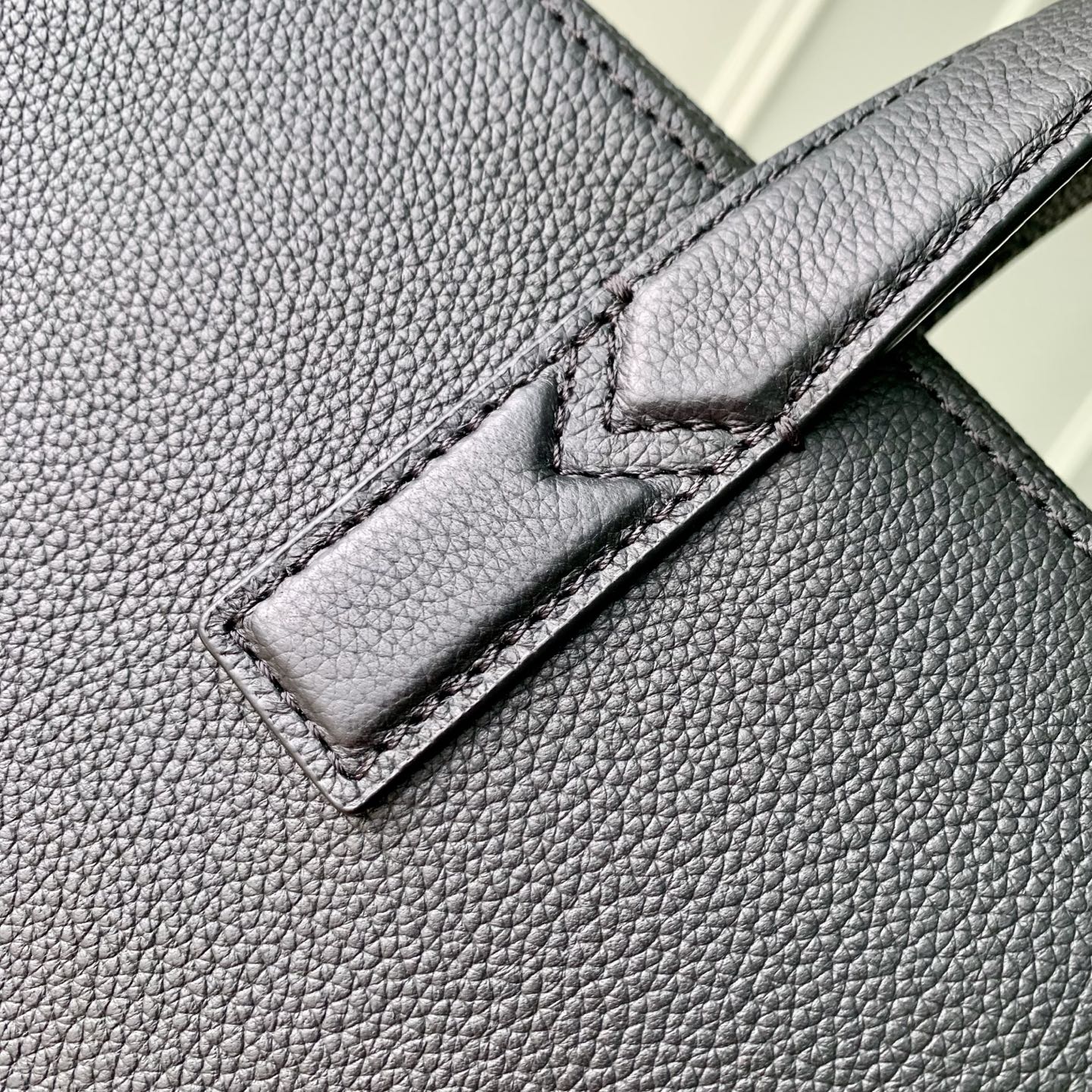 8 Louis Vuitton The M15258 Gate briefcase is crafted from waxed cowhide leather, featuring a supple design and ample space.