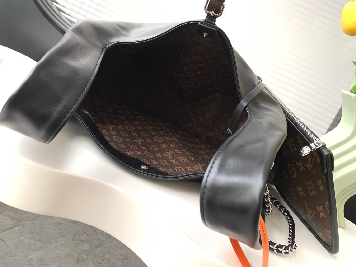 8 Louis Vuitton The M11266 Atlantis medium handbag is from the Dark Side collection.