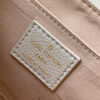 Louis Vuitton The M46393 Favorite handbag is crafted from Monogram Empreinte embossed leather.
